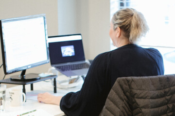 Woman working on computer in office